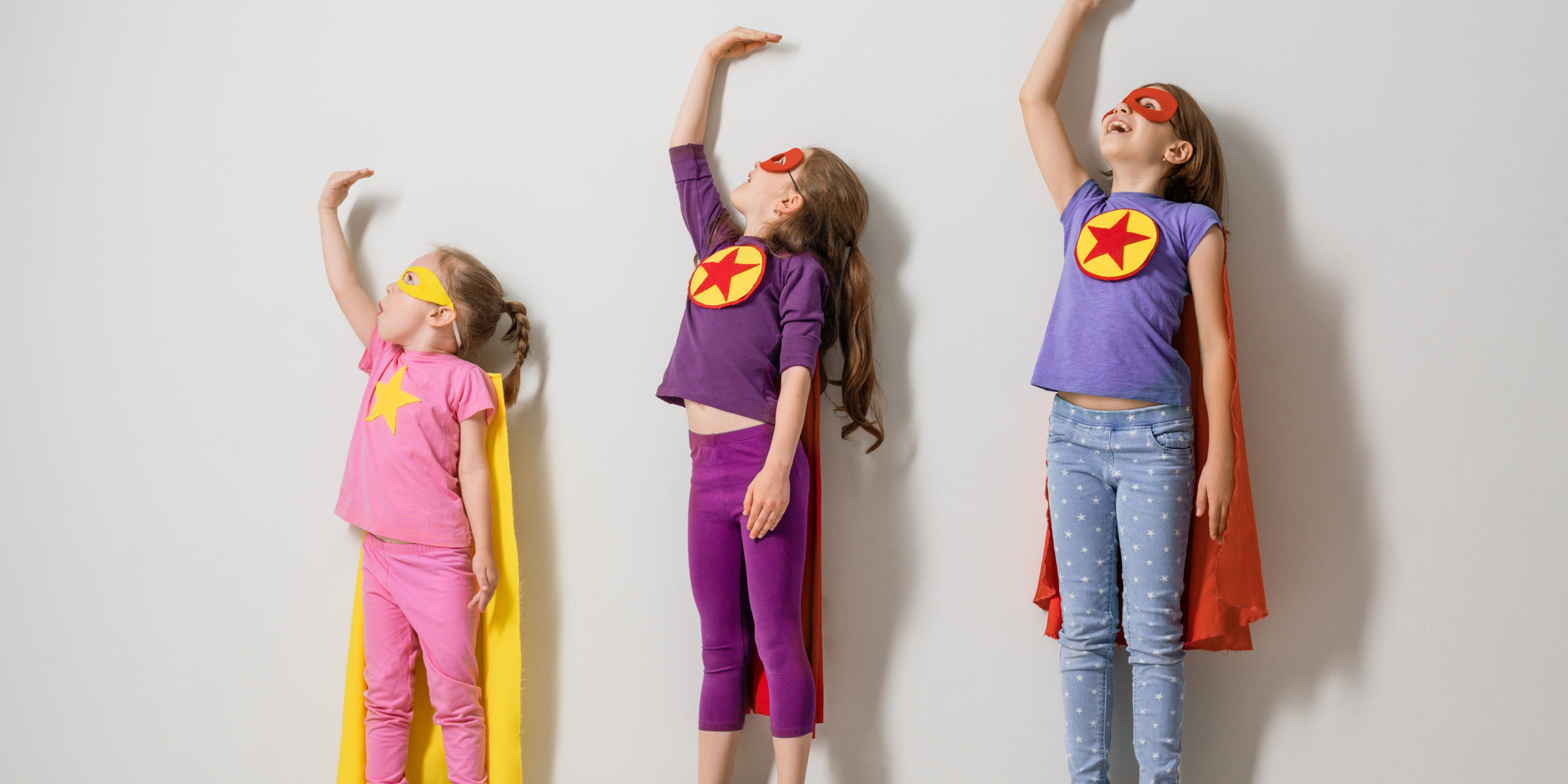 children are playing superhero