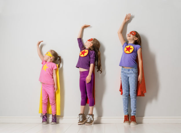 children are playing superhero